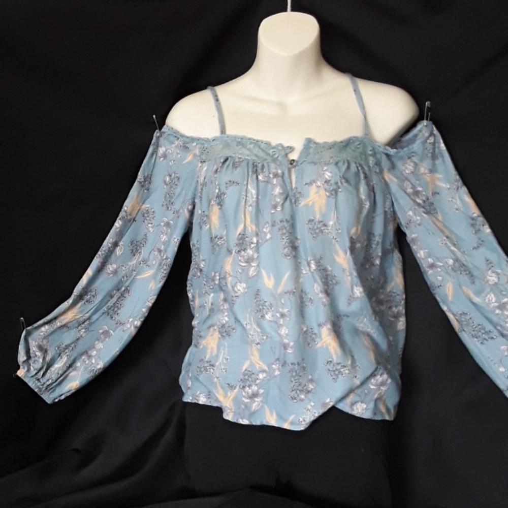 I am selling a floral blouse